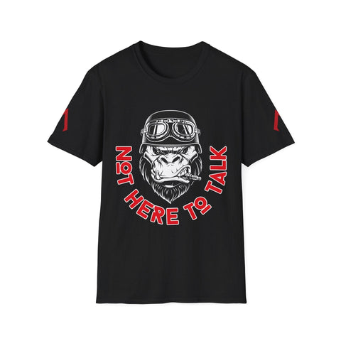 The image shows a black t-shirt featuring a bold, graphic design. At the center, there is an illustration of a gorilla's head wearing aviator goggles and a helmet, with a cigar clenched in its teeth. Surrounding the gorilla, in a semi-circle, are the words "NOT HERE TO TALK" in red, bold letters with a white outline. The design conveys a tough, no-nonsense attitude.