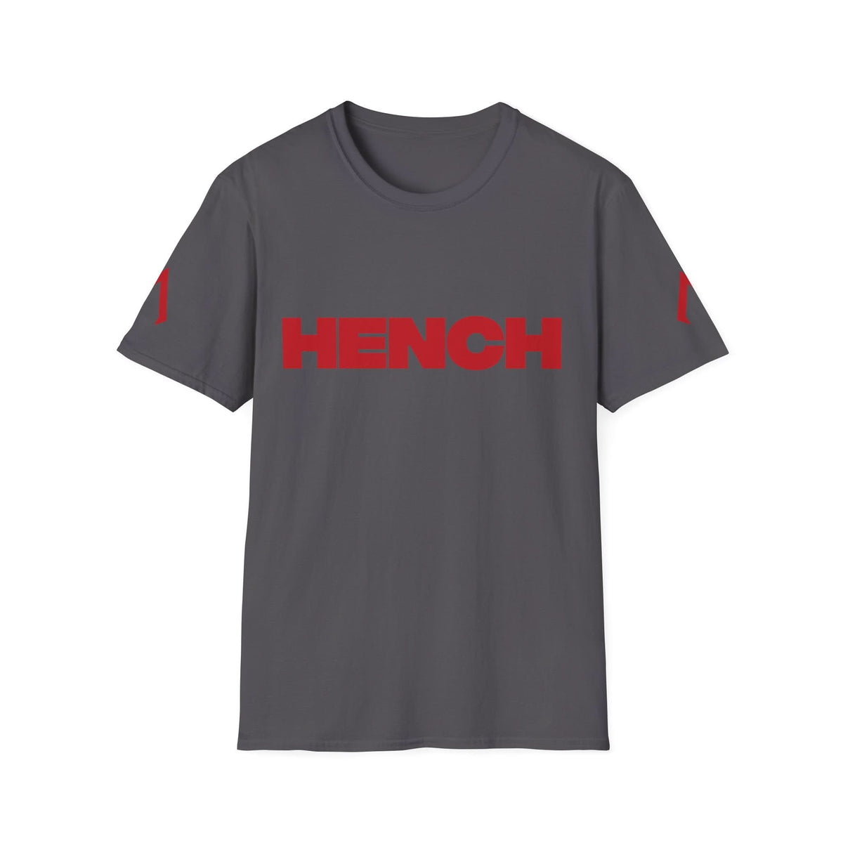 The image shows a dark gray t-shirt with a minimalist design. The primary feature is the word "HENCH" written in large, bold, red capital letters across the chest. The t-shirt also has red markings on the sleeves, but it does not appear to have any other logos or designs. The overall look is simple and bold, emphasizing the word "HENCH."