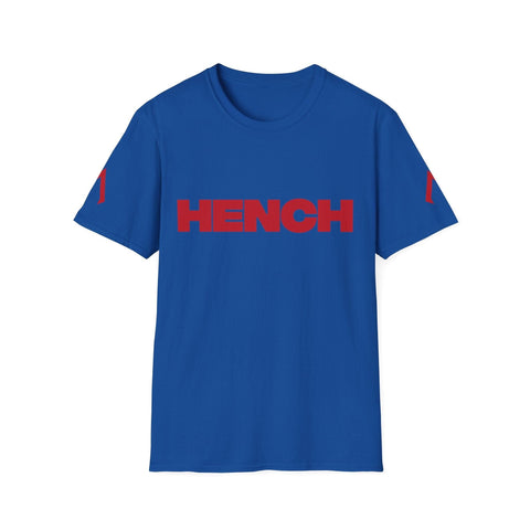 The image shows a royal blue t-shirt with a simple, bold design. The main feature is the word "HENCH" written in large, bold, red capital letters across the chest. Additionally, there are red markings on both sleeves. The design is clean and straightforward, focusing on the prominent "HENCH" text without any additional logos or intricate graphics.